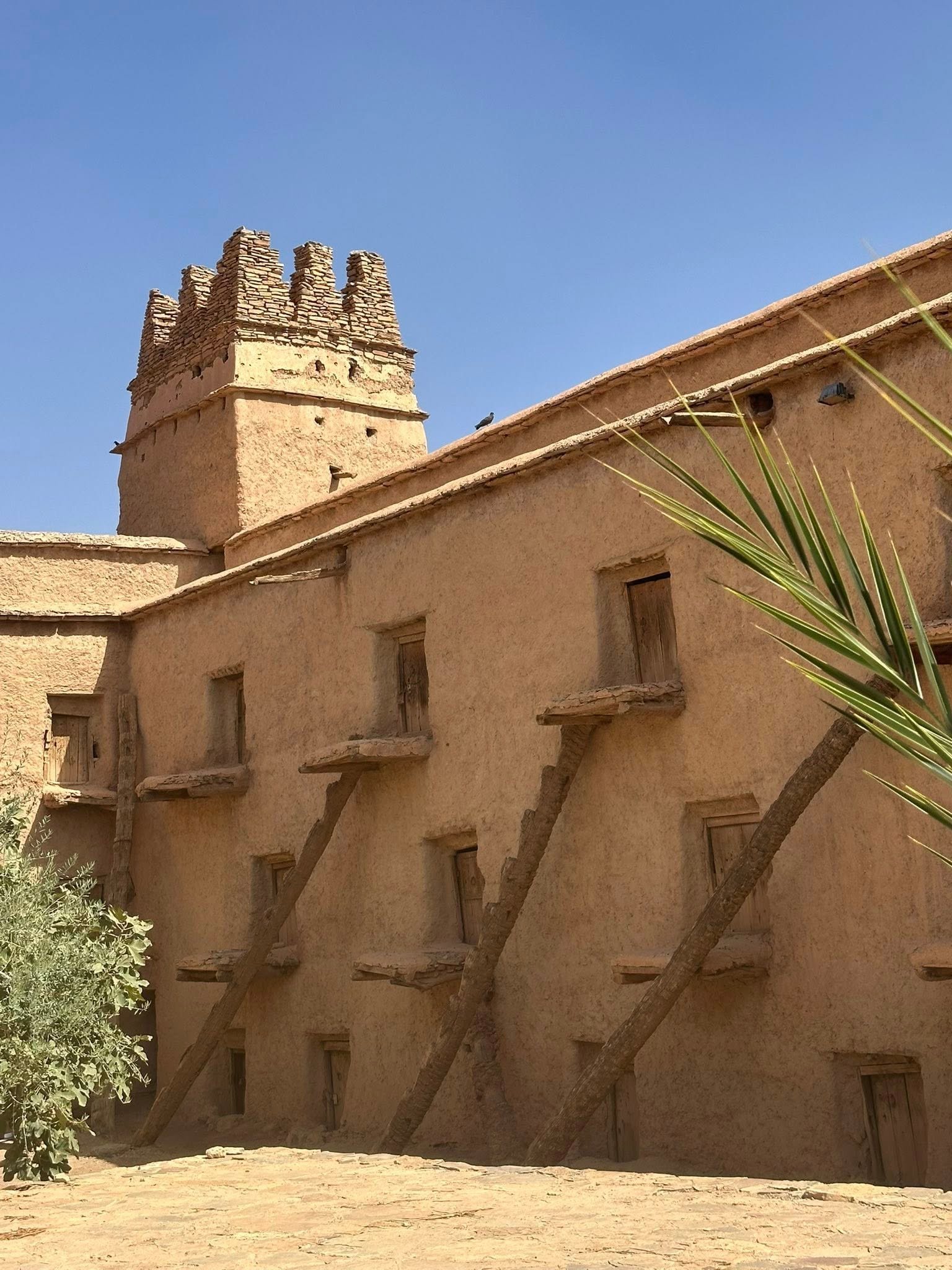 Aït Kine The Aït Kine collective granary is an 18th-century communal storage facility near Tata, Morocco, that serves as both a historical monument and active community center. This traditional agadir features fortress-like architecture with three levels of storage compartments around a central courtyard, built using palm tree trunks adapted to desert conditions. Beyond storage, it hosts village weddings, religious ceremonies, and gatherings, keeping Amazigh Berber traditions alive for travelers seeking authentic Moroccan heritage experiences.