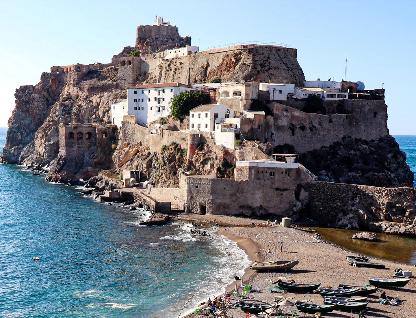 Badis Morocco Discover Badis, Morocco's secret Mediterranean beach near Al Hoceima. Pristine waters, historic island views, and authentic fishing village charm await.